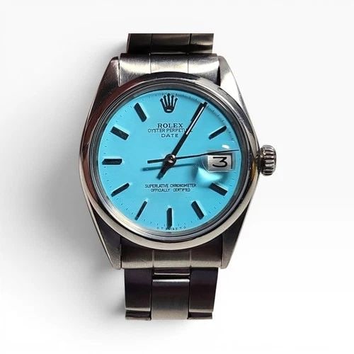 ROLEX DATE 34 MM BLUE TURQUOISE STEEL OYSTER AUTOMATIC WATCH 1501 CIRCA 1969: ROLEX DATE 34 MM BLUE TURQUOISE STEEL OYSTER AUTOMATIC WATCH 1501 CIRCA 1969 Manufacturer Rolex Category Mens Date 34mm Reference Number 1501 Band Stainless Steel Band Color Steel Band Type Oyster Bez