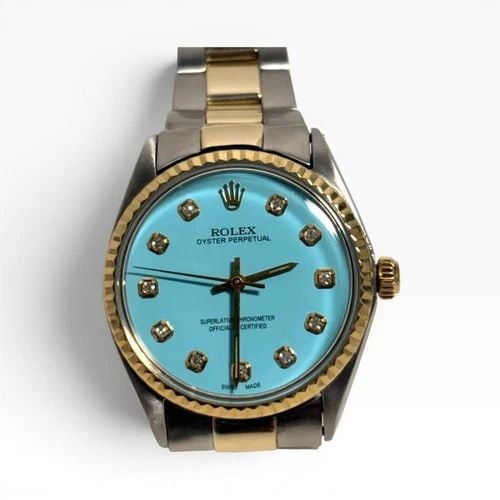 ROLEX OYSTER PERPETUAL 34MM TWO TONE BLUE TURQUOISE DIAMOND WATCH 5500 YEAR 1969: ROLEX OYSTER PERPETUAL 34MM TWO TONE BLUE TURQUOISE DIAMOND WATCH 5500 YEAR 1969 Manufacturer Rolex Category Mens No Date 34mm Reference Number 5500 Band Steel ,Yellow Gold Band Color Yellow Gold & St
