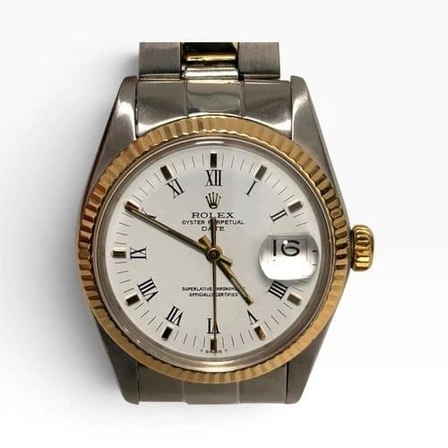 ROLEX DATE 34 MM TWO TONE WHITE ROMAN OYSTER AUTOMATIC WATCH 1501 CIRCA 1975: ROLEX DATE 34 MM TWO TONE WHITE ROMAN OYSTER AUTOMATIC WATCH 1501 CIRCA 1975 Manufacturer Rolex Category Mens Date 34mm Reference Number 1501 Band Steel ,Yellow Gold Band Color Yellow Gold & Stainless