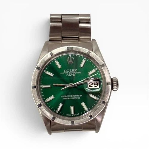 ROLEX DATE 34 MM GREEN DIAL STEEL OYSTER AUTOMATIC WATCH 1501 CIRCA 1973: ROLEX DATE 34 MM GREEN DIAL STEEL OYSTER AUTOMATIC WATCH 1501 CIRCA 1973 Manufacturer Rolex Category Mens Date 34mm Reference Number 1501 Band Stainless Steel Band Color Steel Band Type Oyster Bezel E