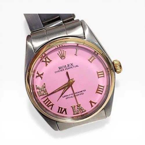 ROLEX OYSTER PERPETUAL 34 MM TWO TONE CANDY PINK DIAMOND DIAL WATCH 1003 1963: ROLEX OYSTER PERPETUAL 34 MM TWO TONE CANDY PINK DIAMOND DIAL WATCH Manufacturer Rolex Category Mens No Date 34mm Subcategory Plastic Crystal Reference Number 1003 Band Stainless Steel Band Color Stee
