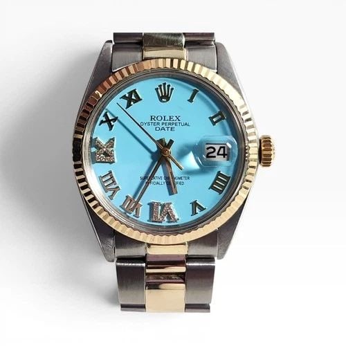 ROLEX DATE 34 MM TWO TONE BLUE TURQUOISE OYSTER AUTOMATIC WATCH 1500 CIRCA 1969: ROLEX DATE 34 MM TWO TONE BLUE TURQUOISE OYSTER AUTOMATIC WATCH 1500 CIRCA 1969 Manufacturer Rolex Category Mens Date 34mm Subcategory Plastic Crystal Non Quick Reference Number 1500 Band Steel ,Yello