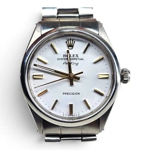 ROLEX AIR KING PRECISION 34 MM WHITE DIAL STEEL AUTOMATIC WATCH 5500 CIRCA 1971: ROLEX AIR KING PRECISION 34 MM WHITE DIAL STEEL AUTOMATIC WATCH 5500 CIRCA 1971 Manufacturer Rolex Category Mens No Date 34mm Reference Number 5500 Band Stainless Steel Band Color Steel Band Type Oyst