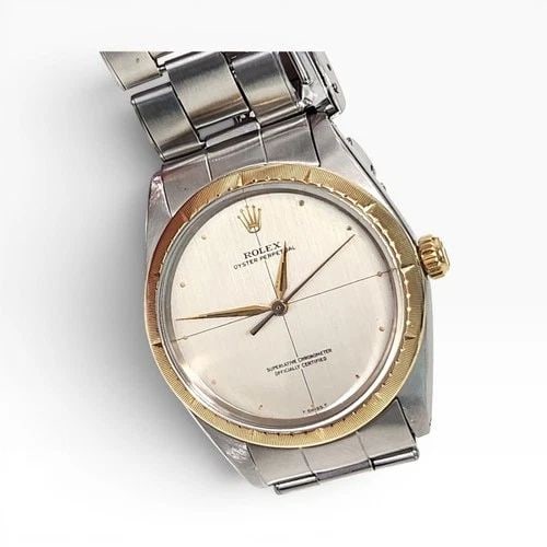 ROLEX OYSTER PERPETUAL 34 MM TWO TONE ZEPHYR AUTOMATIC WATCH 1008 CIRCA 1967: ROLEX OYSTER PERPETUAL 34 MM TWO TONE ZEPHYR AUTOMATIC WATCH 1008 CIRCA 1967 Manufacturer Rolex Category Oyster Perpetual Reference Number 1008 Additional Keywords ZEPHYR BEZEL Band Stainless Steel Ba