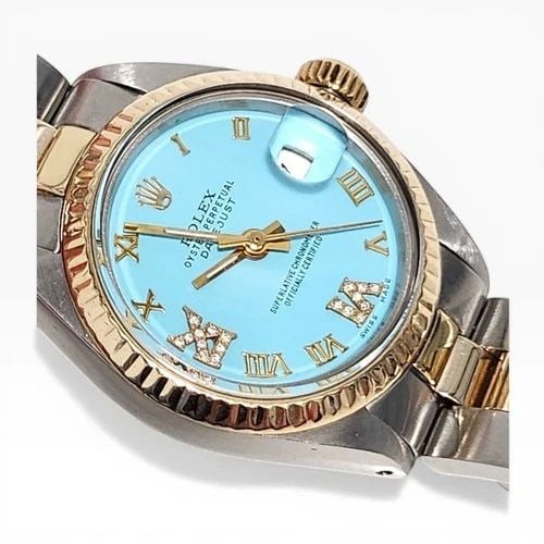 ROLEX LADIES DATEJUST 26MM TWO TONE BLUE TURQUOISE DIAMOND WATCH 6917 CIRCA 1981: ROLEX LADIES DATEJUST 26MM TWO TONE BLUE TURQUOISE DIAMOND WATCH Manufacturer Rolex Category Ladies Datejust Reference Number 6917 Band Steel ,Yellow Gold Band Color Yellow Gold & Stainless Steel Band