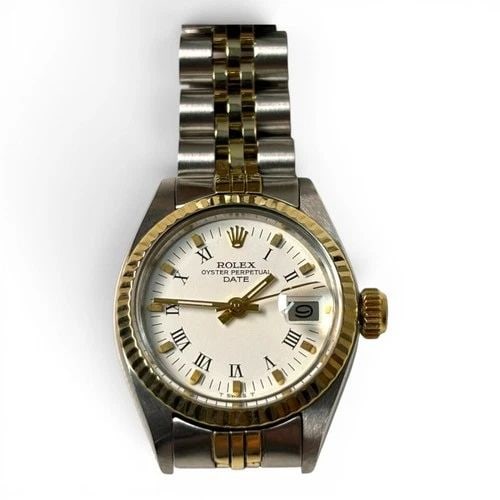 ROLEX LADIES DATE 26 MM TWO TONE JUBILEE WHITE ROMAN AUTOMATIC WATCH 6917 1979: ROLEX LADIES DATE 26 MM TWO TONE JUBILEE WHITE ROMAN AUTOMATIC WATCH 6917 1979 Manufacturer Rolex Category Oyster Perpetual Ladies Date Reference Number 6917 Band Steel ,Yellow Gold Band Color Yellow 