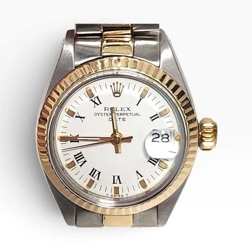 ROLEX LADIES DATE 26 MM TWO TONE OYSTER WHITE ROMAN WATCH 6917 CIRCA 1979: ROLEX LADIES DATE 26 MM TWO TONE OYSTER WHITE ROMAN WATCH 6917 CIRCA 1979 Manufacturer Rolex Category Oyster Perpetual Ladies Date Reference Number 6917 Band Steel ,Yellow Gold Band Color Yellow Gold 