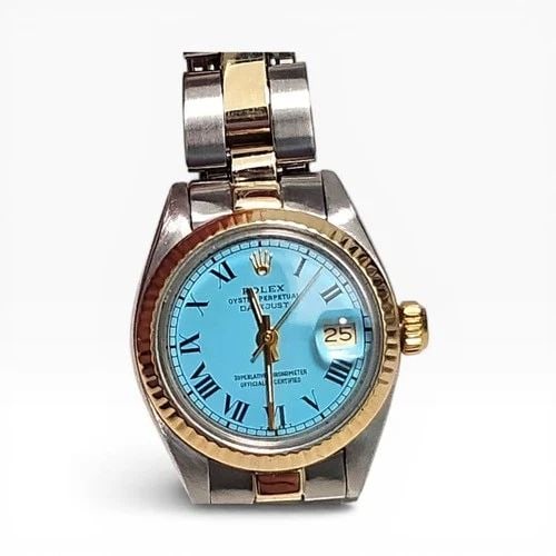 ROLEX LADIES DATEJUST 26 MM TWO TONE BLUE TURQUOISE DIAL WATCH 6917 CIRCA 1981: ROLEX LADIES DATEJUST 26 MM TWO TONE BLUE TURQUOISE DIAL WATCH 6917 CIRCA 1981 Manufacturer Rolex Category Ladies Datejust Reference Number 6917 Band Steel ,Yellow Gold Band Color Yellow Gold & Stainl