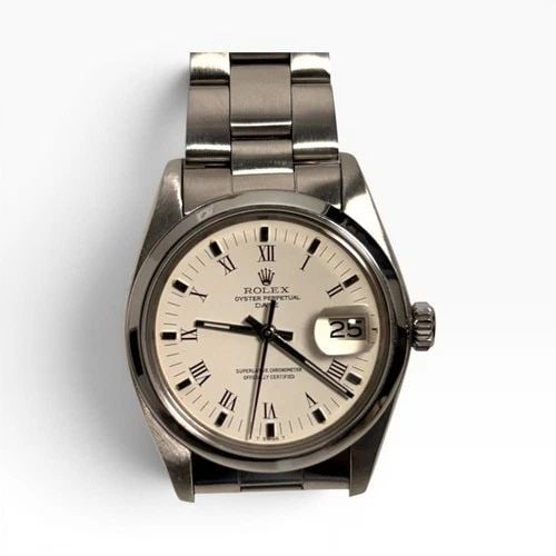 ROLEX DATE 34 MM STEEL WHITE ROMAN OYSTER AUTOMATIC WATCH 1500 CIRCA 1978: ROLEX DATE 34 MM STEEL WHITE ROMAN OYSTER AUTOMATIC WATCH 1500 CIRCA 1978 Manufacturer Rolex Category Mens Date 34mm Subcategory Plastic Crystal Non Quick Reference Number 1500 Band Stainless Steel Ba