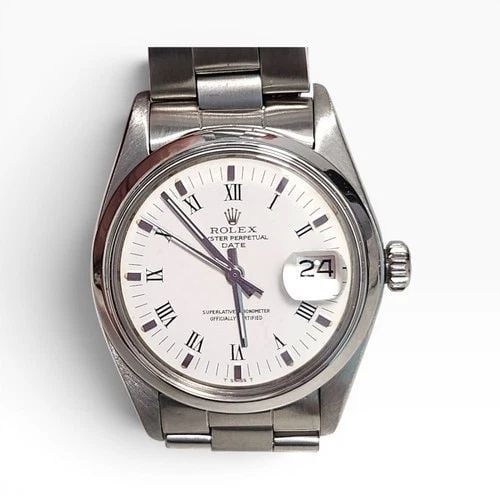 ROLEX DATE 34 MM STEEL WHITE ROMAN OYSTER AUTOMATIC WATCH 1500 CIRCA 1978: ROLEX DATE 34 MM STEEL WHITE ROMAN OYSTER AUTOMATIC WATCH 1500 CIRCA 1978 Manufacturer Rolex Category Mens Date 34mm Subcategory Plastic Crystal Non Quick Reference Number 1500 Band Stainless Steel Ba