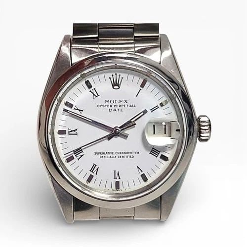 ROLEX DATE 34 MM STEEL WHITE ROMAN OYSTER AUTOMATIC WATCH 1500 CIRCA 1969: ROLEX DATE 34 MM STEEL WHITE ROMAN OYSTER AUTOMATIC WATCH Manufacturer Rolex Category Mens Date 34mm Subcategory Plastic Crystal Non Quick Reference Number 1500 Band Stainless Steel Band Color Steel B