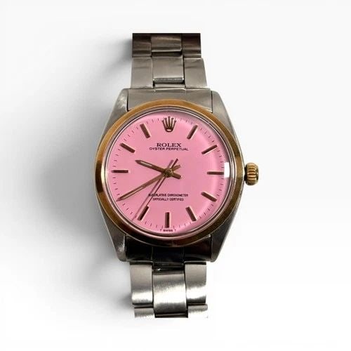 ROLEX OYSTER PERPETUAL 34 MM CANDY PINK DIAL TWO TONE WATCH 1005 CIRCA 1961: ROLEX OYSTER PERPETUAL 34 MM CANDY PINK DIAL TWO TONE WATCH 1005 CIRCA 1961 Manufacturer Rolex Category Mens No Date 34mm Subcategory Plastic Crystal Reference Number 1005 Band Stainless Steel Band Co