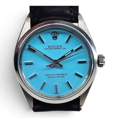 ROLEX OYSTER PERPETUAL 34MM BLUE TURQUOISE STEEL AUTOMATIC WATCH 5500 CIRCA 1974: ROLEX OYSTER PERPETUAL 34MM BLUE TURQUOISE STEEL AUTOMATIC WATCH 5500 CIRCA 1974 Manufacturer Rolex Category Oyster Perpetual Reference Number 5500 Band Leather Band Color Black Band Type Leather Beze