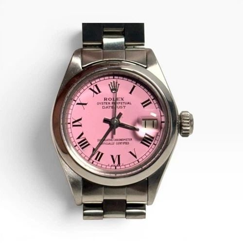 ROLEX LADIES DATEJUST 26 MM STEEL CANDY PINK ROMAN DIAL WATCH 6916 CIRCA 1973: ROLEX LADIES DATEJUST 26 MM STEEL CANDY PINK ROMAN DIAL WATCH 6916 CIRCA 1973 Manufacturer Rolex Category Ladies Datejust Reference Number 6916 Band Stainless Steel Band Color Steel Band Type Oyster B