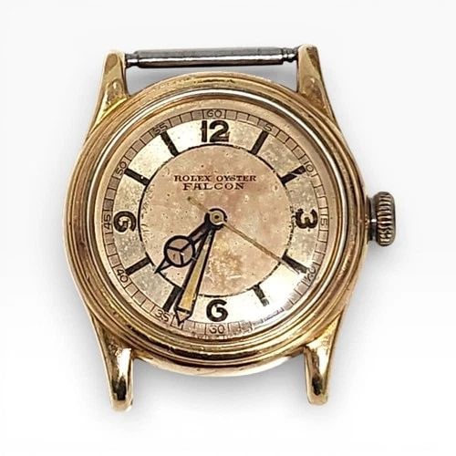 MILITARY ROLEX OYSTER FALCON 26 X 30 MM GOLD PLATED MANUAL WATCH 4310 CIRCA 1942: MILITARY ROLEX OYSTER FALCON 26 X 30 MM GOLD PLATED MANUAL WATCH Manufacturer Rolex Category Vintage Reference Number 4310 Additional Keywords GOLD PLATED MILITARY FALCON Band Type Head Only No Bracel