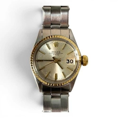 W/PAPERS 1969 ROLEX LADIES DATE TWO TONE OYSTER SILVER DIAL AUTOMATIC WATCH 6517: W/PAPERS 1969 ROLEX LADIES DATE TWO TONE OYSTER SILVER DIAL AUTOMATIC WATCH 6517 Manufacturer Rolex Category Oyster Perpetual Ladies Date Reference Number 6517 Band Stainless Steel Band Color Steel Ba