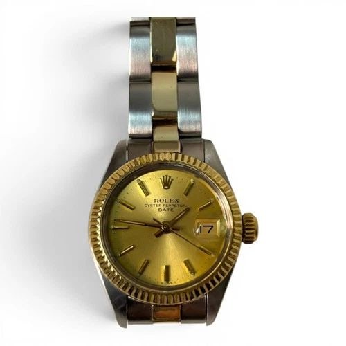 ROLEX LADIES DATE 26MM TWO TONE OYSTER CHAMPAGNE AUTOMATIC WATCH 6916 CIRCA 1981: ROLEX LADIES DATE 26MM TWO TONE OYSTER CHAMPAGNE AUTOMATIC WATCH 6916 CIRCA 1981 Manufacturer Rolex Category Oyster Perpetual Ladies Date Reference Number 6916 Band Steel ,Yellow Gold Band Color Yello
