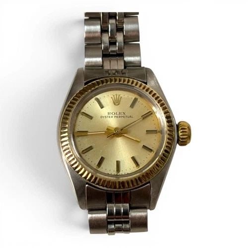 ROLEX OYSTER PERPETUAL LADY 26MM TWO TONE BIG HEAD JUBILEE WATCH 6719 CIRCA 1979: ROLEX OYSTER PERPETUAL LADY 26MM TWO TONE BIG HEAD JUBILEE WATCH 6719 CIRCA 1979 Manufacturer Rolex Category Oyster Perpetual Ladies No Date Subcategory Ladies No Date 2030 Reference Number 6719 Addit