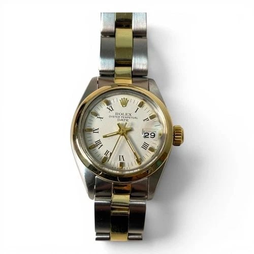 ROLEX LADIES DATE 26 MM TWO TONE OYSTER AUTOMATIC WATCH 6916 CIRCA 1969: ROLEX LADIES DATE 26 MM TWO TONE OYSTER AUTOMATIC WATCH 6916 CIRCA 1969 Manufacturer Rolex Category Oyster Perpetual Ladies Date Reference Number 6916 Band Steel ,Yellow Gold Band Color Yellow Gold & 