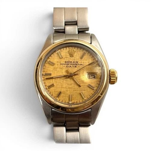 ROLEX LADIES DATE 26MM TWO TONE CHAMPAGNE OYSTER AUTOMATIC WATCH 6916 CIRCA 1979: ROLEX LADIES DATE 26MM TWO TONE CHAMPAGNE OYSTER AUTOMATIC WATCH 6916 CIRCA 1979 Manufacturer Rolex Category Oyster Perpetual Ladies Date Reference Number 6916 Band Stainless Steel Band Color Steel Ba