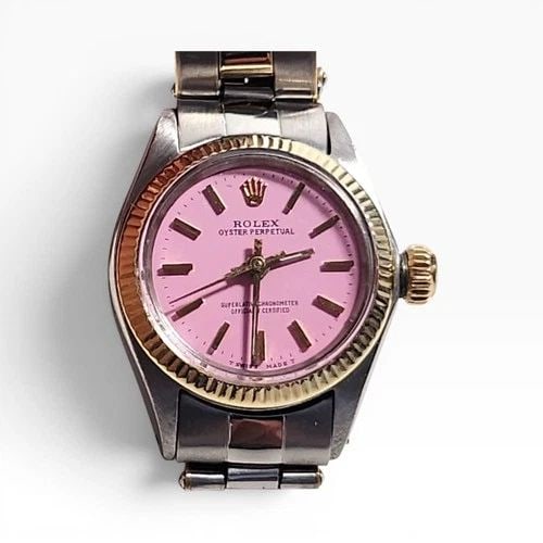 ROLEX OYSTER PERPETUAL LADY 26 MM CANDY PINK DIAL TWO TONE WATCH 6618 CIRCA 1970: ROLEX OYSTER PERPETUAL LADY 26 MM CANDY PINK DIAL TWO TONE WATCH 6618 CIRCA 1970 Manufacturer Rolex Category Oyster Perpetual Ladies No Date Reference Number 6619 Additional Keywords CANDY PINK DIAL B
