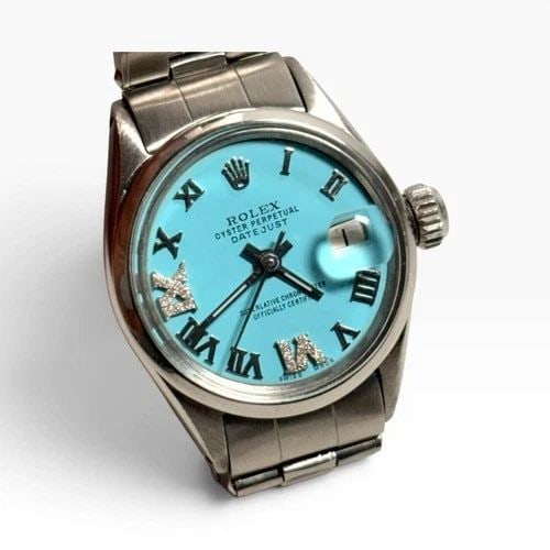 ROLEX LADY DATEJUST 26 MM STEEL BLUE TURQUOISE DIAMOND DIAL AUTOMATIC WATCH 6516: ROLEX LADY DATEJUST 26 MM STEEL BLUE TURQUOISE DIAMOND DIAL AUTOMATIC WATCH 6516 Manufacturer Rolex Category Ladies Datejust Reference Number 6516 Band Stainless Steel Band Color Steel Band Type Oyste