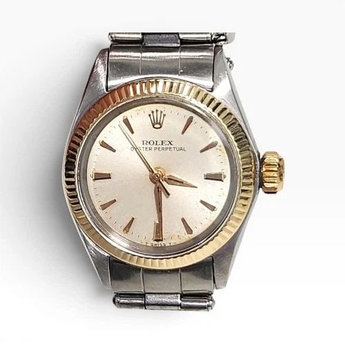 ROLEX OYSTER PERPETUAL LADIES 26 MM TWO TONE AUTOMATIC WATCH 6619 CIRCA 1967: ROLEX OYSTER PERPETUAL LADIES 26 MM TWO TONE AUTOMATIC WATCH 6619 CIRCA 1967 Manufacturer Rolex Category Oyster Perpetual Ladies No Date Reference Number 6619 Band Stainless Steel Band Color Steel Ban