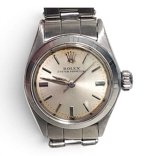 ROLEX OYSTER PERPETUAL LADIES 26 MM STEEL AUTOMATIC WATCH 6623 CIRCA 1966: ROLEX OYSTER PERPETUAL LADIES 26 MM STEEL AUTOMATIC WATCH 6623 CIRCA 1966 Manufacturer Rolex Category Oyster Perpetual Ladies No Date Reference Number 6623 Band Stainless Steel Band Color Steel Band T