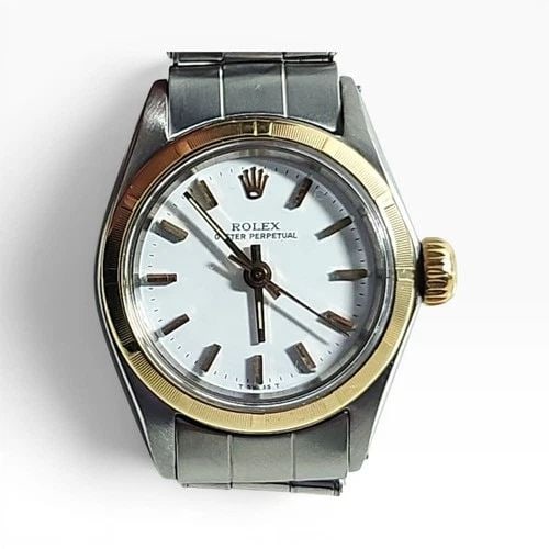 ROLEX OYSTER PERPETUAL LADIES 26 MM TWO TONE WHITE DIAL OYSTER WATCH 6623 1967: ROLEX OYSTER PERPETUAL LADIES 26 MM TWO TONE WHITE DIAL OYSTER WATCH 6623 1967 Manufacturer Rolex Category Oyster Perpetual Ladies No Date Reference Number 6623 Band Stainless Steel Band Color Steel B