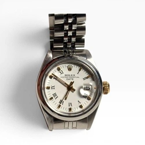 ROLEX LADIES DATE 26MM STEEL JUBILEE WHITE ROMAN AUTOMATIC WATCH 6916 CIRCA 1979: ROLEX LADIES DATE 26MM STEEL JUBILEE WHITE ROMAN AUTOMATIC WATCH 6916 CIRCA 1979 Manufacturer Rolex Category Oyster Perpetual Ladies Date Reference Number 6916 Band Stainless Steel Band Color Steel Ba