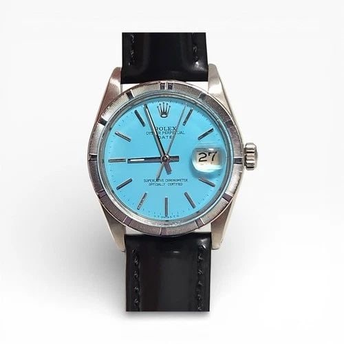 ROLEX DATE 34 MM BLUE TURQUOISE STEEL LEATHER AUTOMATIC WATCH 1500 CIRCA 1965: ROLEX DATE 34 MM BLUE TURQUOISE STEEL LEATHER AUTOMATIC WATCH Manufacturer Rolex Category Mens Date 34mm Subcategory Plastic Crystal Non Quick Reference Number 1500 Band Type Oyster Bezel Smooth Bezel