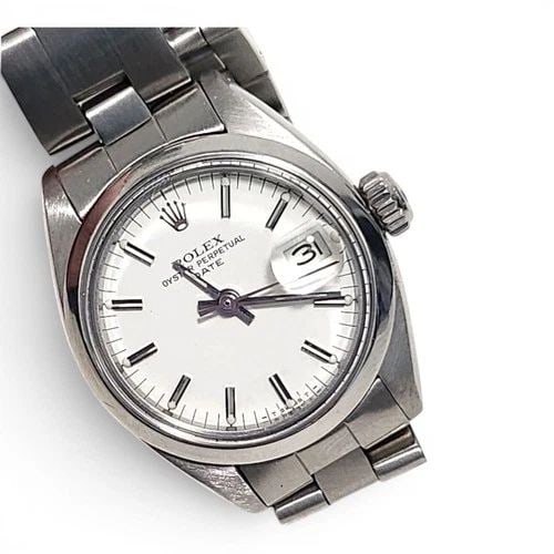 ROLEX LADIES DATE 26 MM OYSTER STEEL WHITE AUTOMATIC WATCH 6916 CIRCA 1982: ROLEX LADIES DATE 26 MM OYSTER STEEL WHITE AUTOMATIC WATCH 6916 CIRCA 1982 Manufacturer Rolex Category Oyster Perpetual Ladies Date Reference Number 6916 Band Stainless Steel Band Color Steel Band Typ