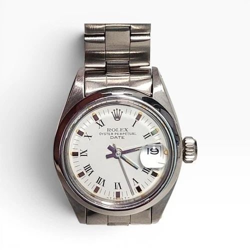 ROLEX LADIES DATE 26 MM STEEL WHITE ROMAN OYSTER AUTOMATIC WATCH 6916 CIRCA 1981: ROLEX LADIES DATE 26 MM STEEL WHITE ROMAN OYSTER AUTOMATIC WATCH 6916 CIRCA 1981 Manufacturer Rolex Category Oyster Perpetual Ladies Date Reference Number 6916 Band Stainless Steel Band Color Steel Ba