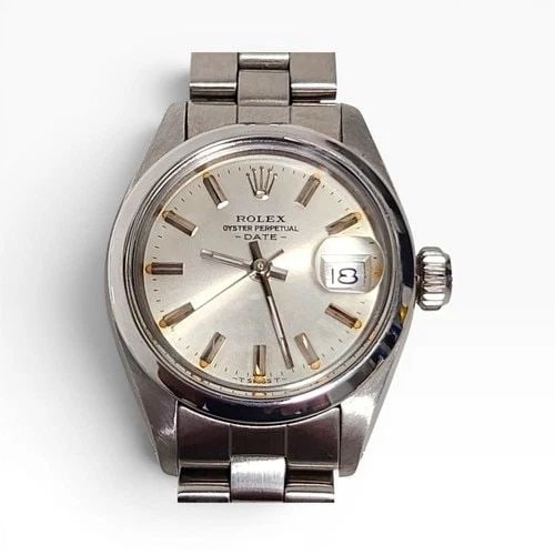 ROLEX LADIES DATE 26 MM STEEL OYSTER AUTOMATIC WATCH 6916 CIRCA 1979: ROLEX LADIES DATE 26 MM STEEL OYSTER AUTOMATIC WATCH 6916 CIRCA 1979 Manufacturer Rolex Category Oyster Perpetual Ladies Date Reference Number 6916 Band Stainless Steel Band Color Steel Band Type Oyst