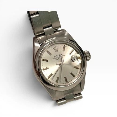 ROLEX LADIES DATE STEEL JUBILEE SILVER DIAL AUTOMATIC WATCH 6916 CIRCA 1974: ROLEX LADIES DATE STEEL JUBILEE SILVER DIAL AUTOMATIC WATCH 6916 CIRCA 1974 Manufacturer Rolex Category Oyster Perpetual Ladies Date Reference Number 6916 Band Stainless Steel Band Color Steel Band Ty