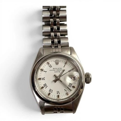 ROLEX LADIES DATE 26MM STEEL JUBILEE WHITE ROMAN AUTOMATIC WATCH 6916 CIRCA 1979: ROLEX LADIES DATE 26MM STEEL JUBILEE WHITE ROMAN AUTOMATIC WATCH 6916 CIRCA 1979 Manufacturer Rolex Category Oyster Perpetual Ladies Date Reference Number 6916 Band Stainless Steel Band Color Steel Ba