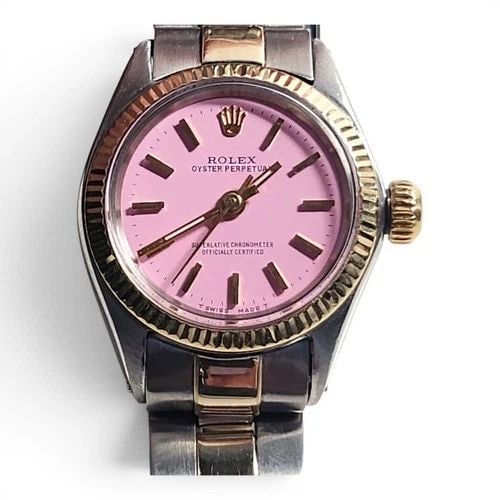 ROLEX OYSTER PERPETUAL LADY 26 MM TWO TONE CANDY PINK DIAL WATCH 6618 CIRCA 1969: ROLEX OYSTER PERPETUAL LADY 26 MM TWO TONE CANDY PINK DIAL WATCH 6618 CIRCA 1969 Manufacturer Rolex Category Oyster Perpetual Ladies No Date Reference Number 6618 Additional Keywords CANDY PINK Band S