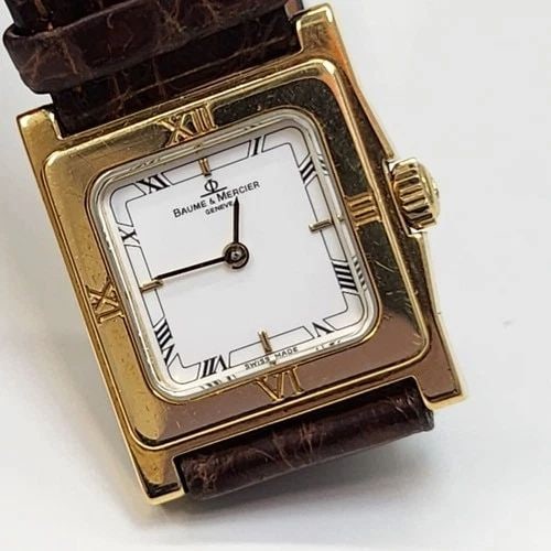 BAUME & MERCIER CLASSIC LADIES 20 X 25 MM 18K YELLOW GOLD MANUAL WATCH 18612: BAUME & MERCIER CLASSIC LADIES 20 X 25 MM 18K YELLOW GOLD MANUAL WATCH Manufacturer Baume & Mercier Category Classic Reference Number 18612 Band Color Brown Band Type Leather Box No Case Lock Screw Do