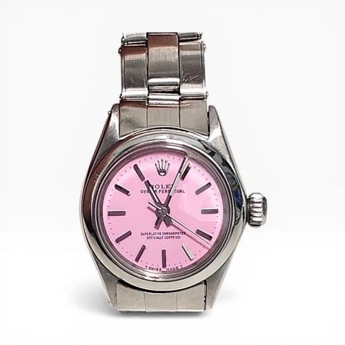 ROLEX OYSTER PERPETUAL LADIES 26 MM STEEL CANDY PINK DIAL WATCH 6618 CIRCA 1963: ROLEX OYSTER PERPETUAL LADIES 26 MM STEEL CANDY PINK DIAL WATCH 6618 CIRCA 1963 Manufacturer Rolex Category Oyster Perpetual Ladies No Date Reference Number 6618 Additional Keywords CANDY PINK DIAL Ba