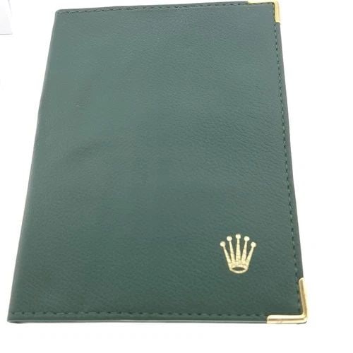 ROLEX PASSPORT WALLET RARE & VINTAGE GREEN GRAIN LEATHER LARGE REF 0068.08.34: ROLEX PASSPORT WALLET RARE & VINTAGE GREEN GRAIN LEATHER LARGE REF 0068.08.34 Manufacturer Rolex Reference Number 0068.08.34 Additional Keywords Rare & Vintage Green Grain Leather Large ref 0068.08.34