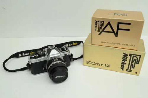AUTHENTIC NIKON FE2 CAMERA 50MM LENS & NIKKOR F/4 ZOOM-NIKKOR 35~100MM F/3.5~4.5 (1 of 2)