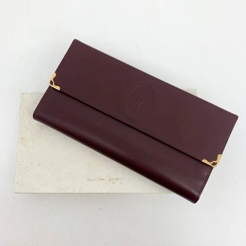 AUTHENTIC CARTIER BURGUNDY LEATHER CLUTCH CLIP WALLET LOGO GP VINTAGE COIN CASE: AUTHENTIC CARTIER BURGUNDY LEATHER CLUTCH CLIP WALLET LOGO GP VINTAGE COIN CASE AUTHENTIC CARTIER BURGUNDY LEATHER CLUTCH CLIP WALLET LOGO GP VINTAGE COIN CASE