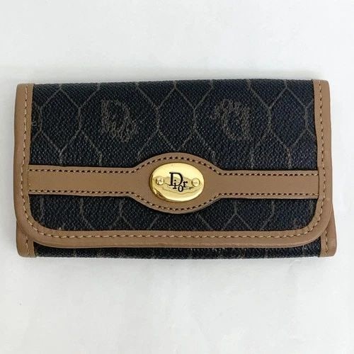 AUTHENTIC CHRISTIAN DIOR VINTAGE LEATHER 6 KEY CASE BLACK TAN GOLD PLATED: AUTHENTIC CHRISTIAN DIOR VINTAGE LEATHER 6 KEY CASE BLACK TAN GOLD PLATED Christian Dior Clip Closure 6-Key Ring, Card Holder, Key Holder Width: 11 cm Height: 6.0 cm Black, Tan, Gold Gold Plated, Leat