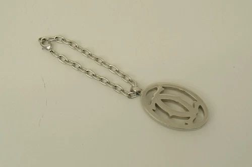 AUTHENTIC CARTIER DECOR LOGO CLASSIC SILVER KEYCHAIN SWISS MADE SIGNATURE CHARM: AUTHENTIC CARTIER DECOR LOGO CLASSIC SILVER KEYCHAIN SWISS MADE SIGNATURE CHARM Authentic Cartier Decor Logo Classic Silver Keychain Swiss Made Signature Charm Authentic Cartier Decor Logo Classic Sil