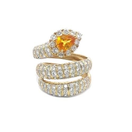 DIAMOND SAPPHIRE GOLD WRAP RING 2.23CT 18K YELLOW TRIPLE ROW SNAKE STYLE: DIAMOND SAPPHIRE GOLD WRAP RING 2.23CT 18K YELLOW TRIPLE ROW SNAKE STYLE This is a gorgeous eye-catching ring; it features a triple band style at the front of the ring in a wrap ring style with a pear