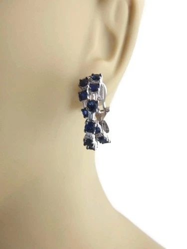 DIAMOND & SAPPHIRE GOLD EARRINGS 18K WHITE DOUBLE CROSSOVER LARGE HOOPS: DIAMOND & SAPPHIRE GOLD EARRINGS 18K WHITE DOUBLE CROSSOVER LARGE HOOPS These Diamond & Sapphire Gold Earrings are crafted with 18k white gold and feature a double crossover design with large hoops. T