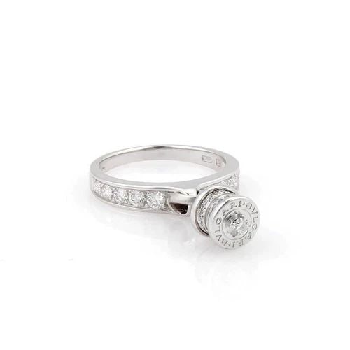 BVLGARI B ZERO.1 ELEMENT RING DIAMOND 18K WHITE GOLD DROP CHARM BAND: BVLGARI B ZERO.1 ELEMENT RING DIAMOND 18K WHITE GOLD DROP CHARM BAND Bvlgari B Zero.1 Element Diamond 18k White Gold Drop Charm Band Ring Description This authentic Bvlgari charm ring is finely crafte
