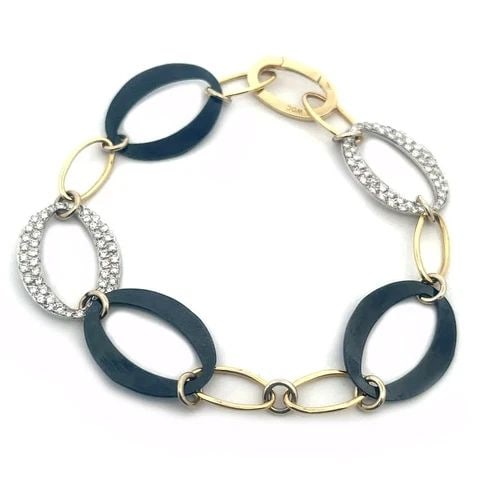 BRACELET GOLD DIAMOND ICED 18K LINK YELLOW & STAINLESS-STEEL OVAL FASHION LINK: BRACELET GOLD DIAMOND ICED 18K LINK YELLOW & STAINLESS-STEEL OVAL FASHION LINK This is a lovely 18k yellow and white gold bracelet with black stainless steel links. The larger links are flat and alter