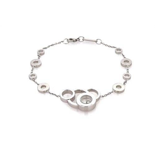 CHOPARD BRACELET HAPPY DREAMS DIAMOND 18K WHITE GOLD CIRCLE MOTIFS CHAIN: CHOPARD BRACELET HAPPY DREAMS DIAMOND 18K WHITE GOLD CIRCLE MOTIFS CHAIN The Chopard Bracelet Happy Dreams is a luxurious piece of fine jewelry crafted from 18k white gold with charming circle motifs 