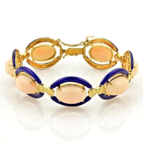 ANGEL SKIN CORAL GOLD BRACELET ENAMEL 14K YELLOW OVAL LINKS STYLE: ANGEL SKIN CORAL GOLD BRACELET ENAMEL 14K YELLOW OVAL LINKS STYLE The Angel Skin Coral Gold Bracelet is a stunning piece of vintage and antique jewelry perfect for women. Crafted with 14k yellow gold 